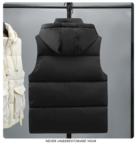 Detail view of hooded quilted puffer vest with flap pockets and high-quality stitching