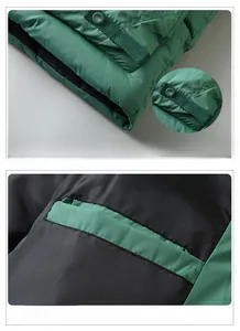 Detail of outdoor hooded vest featuring tactical hem webbing and secure inner pocket