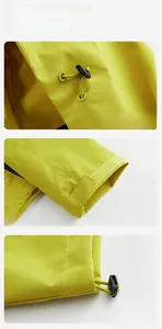 Detail view of adjustable windproof hood strings, velcro cuffs, and hem toggles on jacket