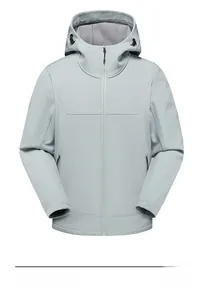 Detail of water-resistant outdoor softshell jacket with high collar and zip pockets
