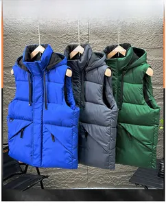 Detail view of hooded quilted vests in blue, gray and green with smooth zippers