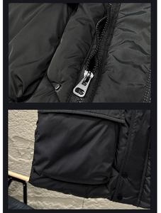Détail de la veste noire matelassée coupe-vent avec fermeture éclair en argent et poche cargo