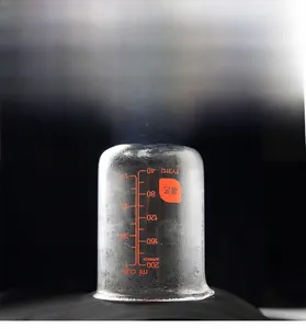 Macro shot of breathable fabric test with steam inside a measuring glass cup