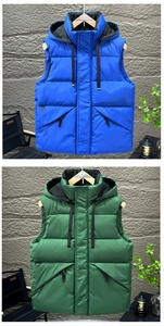 Detail of hooded down vest with windproof drawstrings and large side pockets