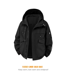 Detail view of black outdoor jacket featuring warm fleece lining and windproof design