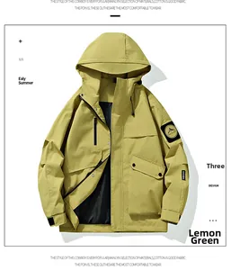 Detail of lemon green hooded outdoor jacket with functional chest pockets and zip closure