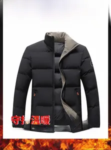 Detail of men's black winter jacket featuring high stand collar and contrast khaki lining