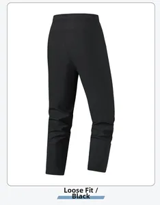 Detail of men's quick-dry black ice silk trousers featuring a loose cuff design