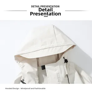 Detail view of the drawstring hood and collar on a beige windbreaker jacket