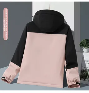 Rear view of women outdoor jacket in pink and black with windproof velcro cuffs