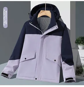 Detail of hooded outdoor jacket featuring purple-blue splicing and honeycomb lining