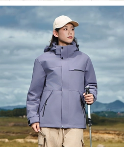 Detail of lavender waterproof outdoor jacket with adjustable hood and zipper pockets