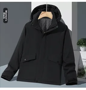 Detail of women's black outdoor jacket showing silver hexagonal honeycomb hood lining