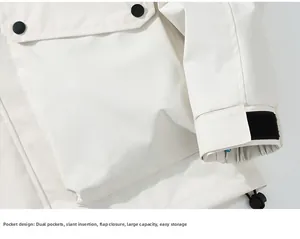 Detail of off-white windbreaker with double pockets, velcro cuffs and adjustable drawstring