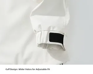Detail of adjustable windproof jacket cuffs with wide black hook and loop fasteners