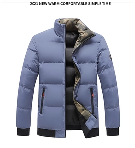 Detail view of light blue padded jacket with stand collar and camouflage lining accents