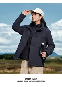 Detail of a 3-in-1 waterproof jacket showing windproof hood and durable outdoor fabric