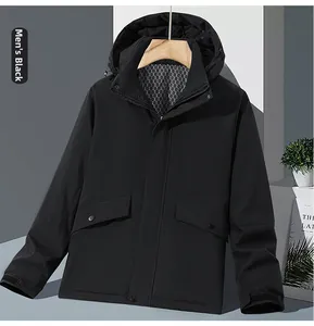 Detail of black waterproof outdoor jacket showing hexagonal fleece lining and front pockets