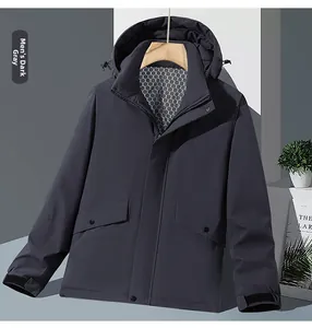 Close-up of hooded dark gray outdoor jacket showing windproof collar and functional lining