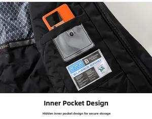 Detail of a black outdoor jacket showing a secure hidden inner zipper pocket with mesh lining