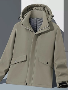 Waterproof outdoor hooded jacket in khaki green with functional pockets and velcro cuffs