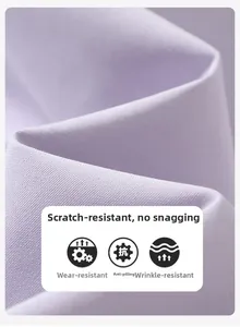 Close-up of lavender outdoor jacket fabric showing scratch-resistant and durable texture