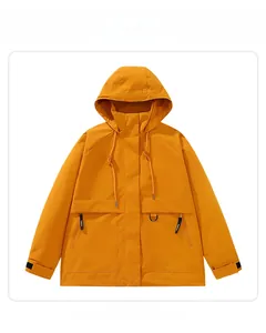 Detail of a bright yellow hooded windbreaker with drawstring and velcro cuffs