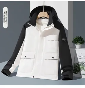 Detail of outdoor jacket with black and white splicing, zipper, and mountain logo