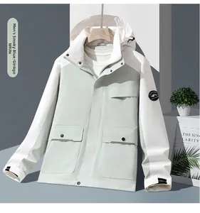 Detail of outdoor jacket showing patch badge and adjustable velcro cuffs on the sleeve