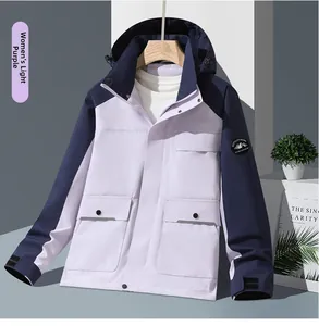 Detail of outdoor jacket showing lavender and navy color block design and pockets