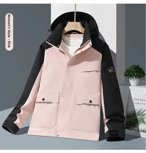 Detailed view of pink and black outdoor jacket with reflective strips and hood