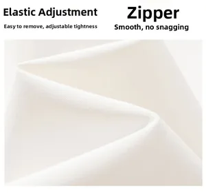 Detailed macro view of white outdoor jacket with smooth zipper and elastic adjustment cord