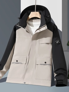 Outdoor color-block hooded jacket in beige and black with waterproof windproof fabric