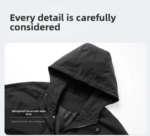 Detail of windproof hooded jacket featuring a large brim for face protection and comfort