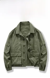 Detail of army green work jacket featuring functional multi-pockets and premium twill fabric