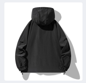 Rear view of black hooded jacket featuring windproof fabric and adjustable drawstring hem