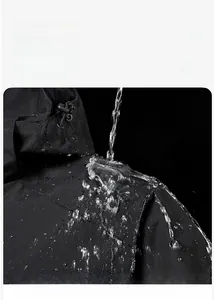 Detailed view of the water-resistant fabric and adjustable drawstring hood on the jacket