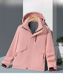 Detail of pink waterproof parka showing honeycomb lining and adjustable velcro cuffs