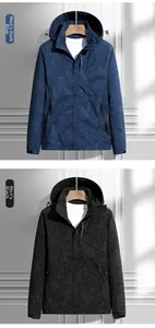 Detail view of men's hooded windbreakers in dark blue and black with leaf pattern