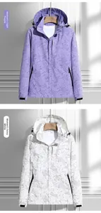 Detail view of waterproof maple pattern jacket with adjustable hood and zip pockets
