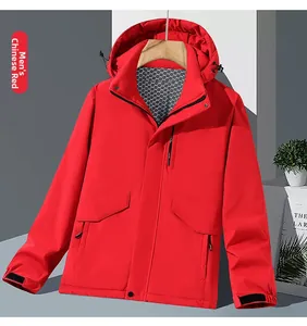 Detail of red outdoor jacket showing adjustable drawstring hood and honeycomb mesh lining