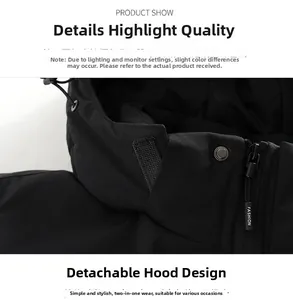 Detail view of a black outdoor jacket featuring a detachable hood and adjustable drawstrings