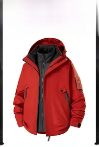 Detail of red 3-in-1 hiking jacket with removable down liner and mountain sleeve patch