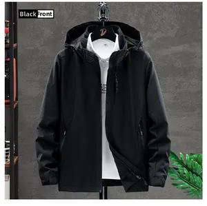 Front detail of black hooded jacket with vertical EXPLORE print and zip pockets