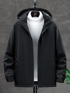 Men's black waterproof windbreaker jacket with hooded design and explore text detail