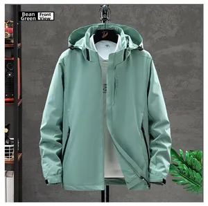 Detail view of the bean green outdoor jacket with adjustable velcro cuffs and pockets