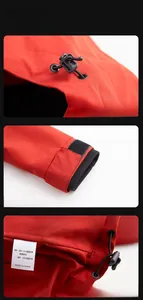 Detail of red windproof jacket featuring adjustable hood cords and velcro cuff closures