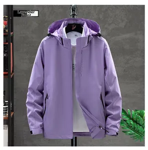 Detail view of taro purple outdoor windbreaker jacket with EXPLORE print and zip pockets