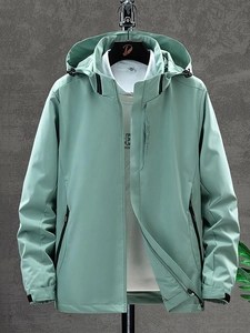 Waterproof mint green hooded jacket for men and women featuring the Explore print