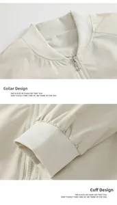 Detailed close-up of ribbed baseball collar and matching elastic cuffs on beige jacket